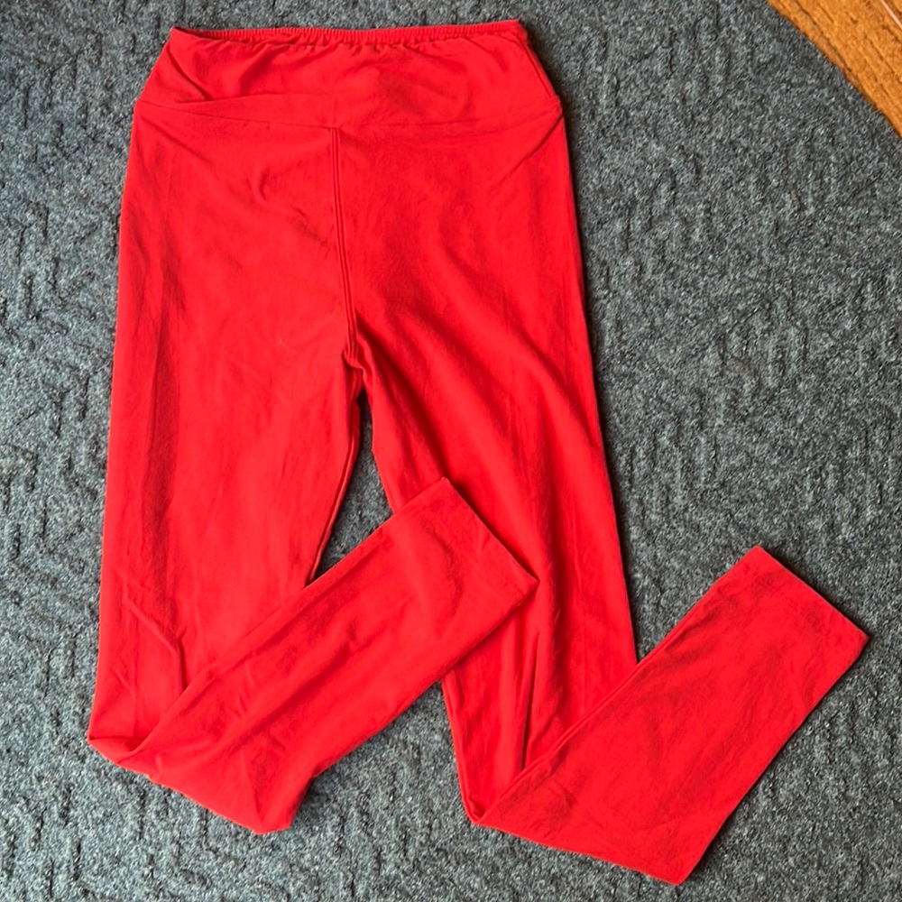 LulaRoe Tween red leggings.